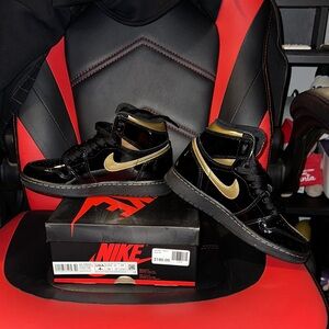 Nike Black and Gold High-Tops